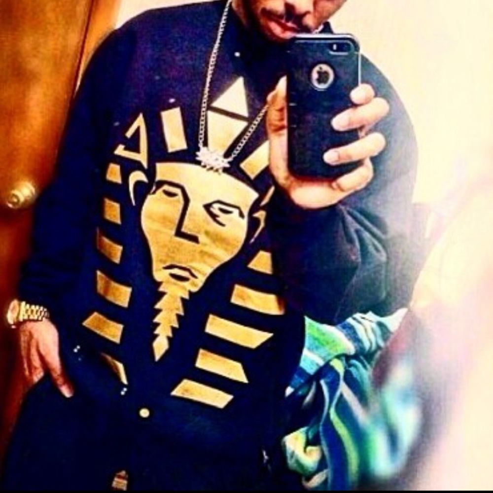 - Gold foil Pharaoh sweater